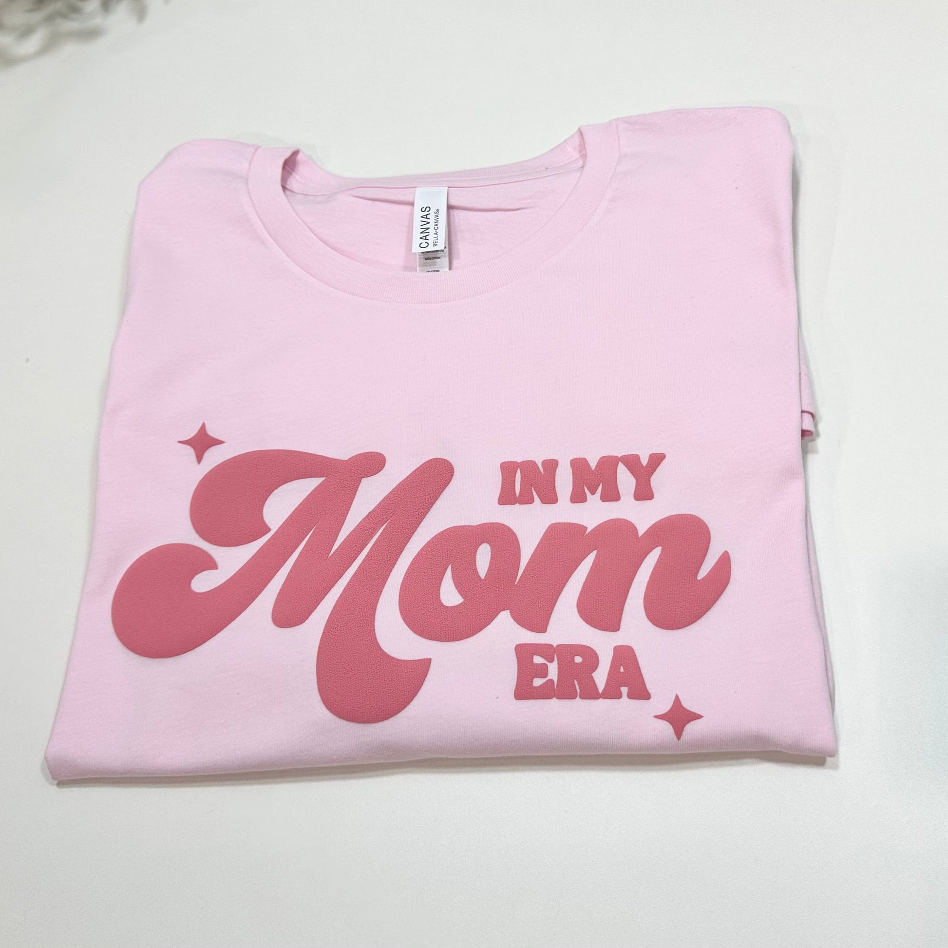 light pink shirt with in my mom era puff design in dark pink color