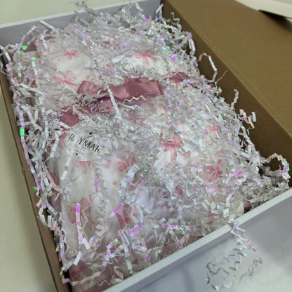 Pregnancy reveal Gift box with pink ribbon and decorative paper inside