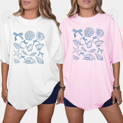 white and pink shirt with a coquette seashell design in pastel blue color